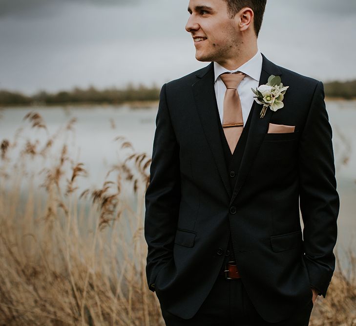 Groom in Moss Bros Suit