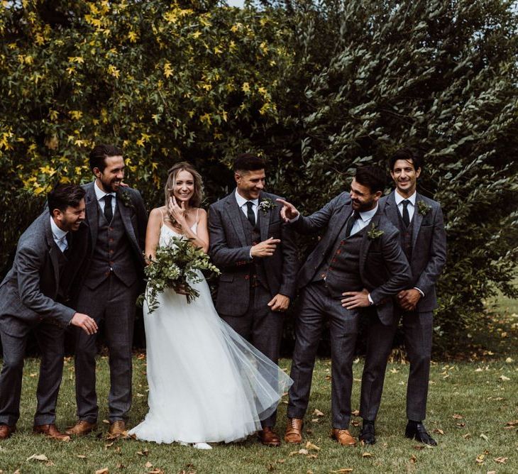 Bride and groom with their guests at 'Peaky Blinders' styled wedding