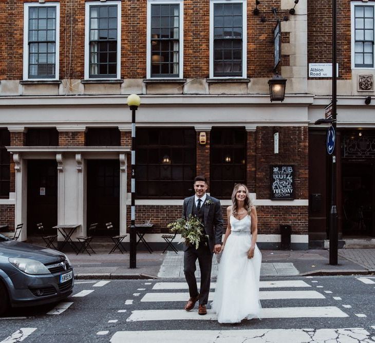 Bride and groom at Stoke Newington Town Hall wedding in autumn