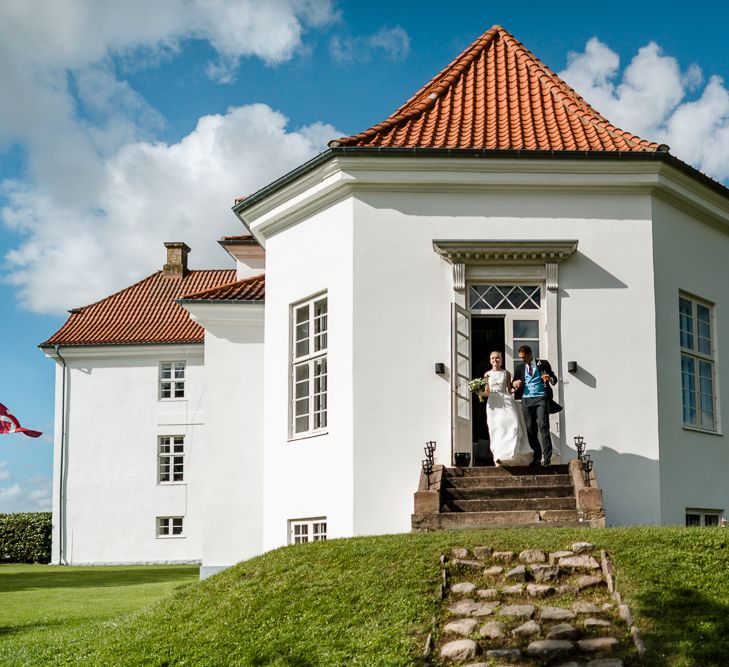 Bride in Caroline Castigliano Wedding Dress | Groom in Henry Herbert Tailors Morning Suit | Traditional Green/Blue Danish Wedding at Scandinavian Country House, Jomfruens Egede in Faxe, Denmark | John Barwood Photography