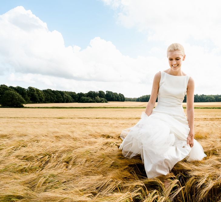 Bride in Caroline Castigliano Wedding Dress | Traditional Green/Blue Danish Wedding at Scandinavian Country House, Jomfruens Egede in Faxe, Denmark | John Barwood Photography