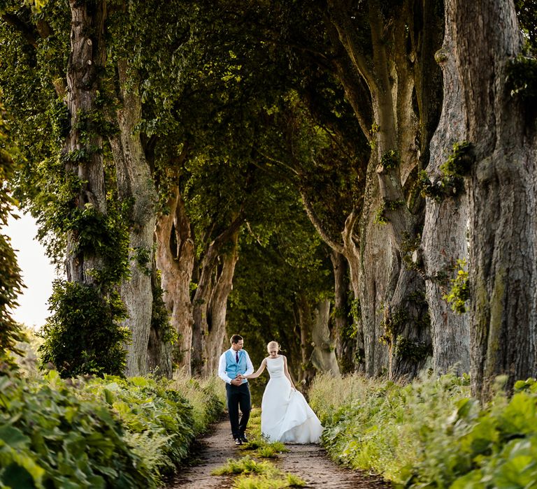 Bride in Caroline Castigliano Wedding Dress | Groom in Henry Herbert Tailors Morning Suit | Traditional Green/Blue Danish Wedding at Scandinavian Country House, Jomfruens Egede in Faxe, Denmark | John Barwood Photography