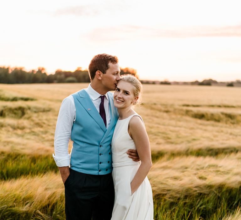 Bride in Caroline Castigliano Wedding Dress | Groom in Henry Herbert Tailors Morning Suit | Traditional Green/Blue Danish Wedding at Scandinavian Country House, Jomfruens Egede in Faxe, Denmark | John Barwood Photography