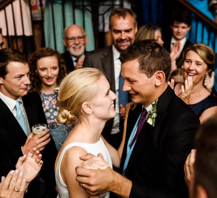 First Dance | Bride in Caroline Castigliano Wedding Dress | Groom in Henry Herbert Tailors Morning Suit | Traditional Green/Blue Danish Wedding at Scandinavian Country House, Jomfruens Egede in Faxe, Denmark | John Barwood Photography