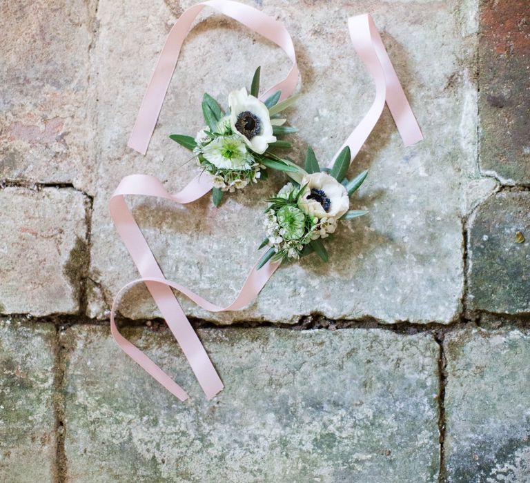 Anemone Corsages with Pink Ribbon | Four Day Italian Destination Wedding at Frattoria Mansi Bernadini Planned by Weddings by Emily Charlotte | Cecelina Photography