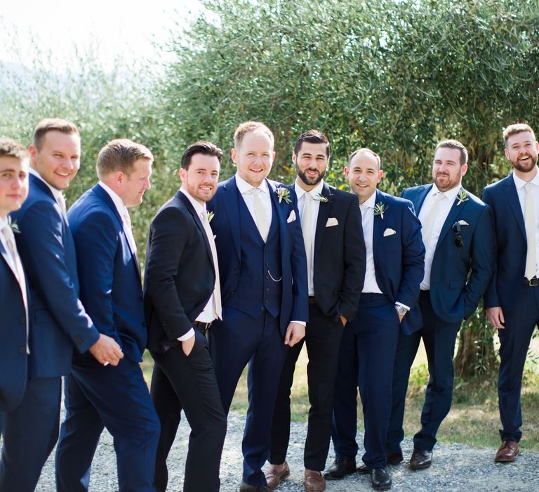 Groomsmen in Navy Suits | Four Day Italian Destination Wedding at Frattoria Mansi Bernadini Planned by Weddings by Emily Charlotte | Cecelina Photography