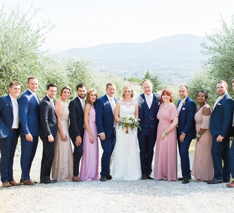 Wedding Party | Bride in Lace Stella York Gown | Bridesmaids in Different Pink Dresses | Groomsmen in Navy Suits | Four Day Italian Destination Wedding at Frattoria Mansi Bernadini Planned by Weddings by Emily Charlotte | Cecelina Photography