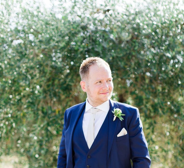 Groom in Three Piece Navy Suit &amp; White Tie | Four Day Italian Destination Wedding at Frattoria Mansi Bernadini Planned by Weddings by Emily Charlotte | Cecelina Photography