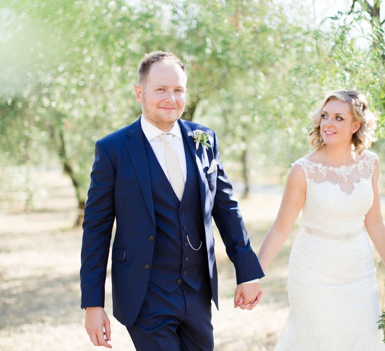 Bride in Lace Stella York Wedding Dress | Groom in Three Piece Navy Suit | Four Day Italian Destination Wedding at Frattoria Mansi Bernadini Planned by Weddings by Emily Charlotte | Cecelina Photography