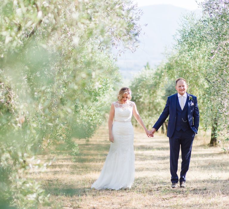 Bride in Lace Stella York Wedding Dress | Groom in Three Piece Navy Suit | Four Day Italian Destination Wedding at Frattoria Mansi Bernadini Planned by Weddings by Emily Charlotte | Cecelina Photography