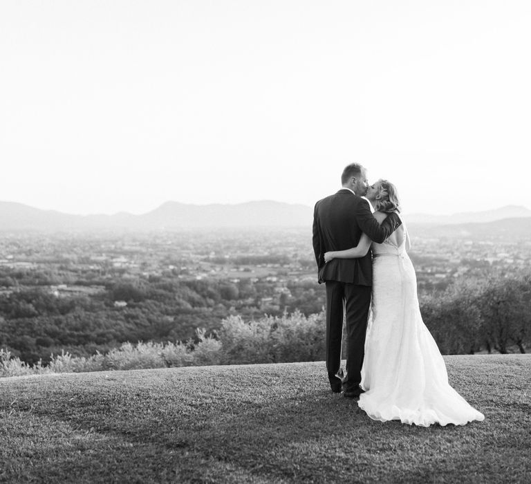 Bride in Lace Stella York Wedding Dress | Groom in Three Piece Navy Suit | Four Day Italian Destination Wedding at Frattoria Mansi Bernadini Planned by Weddings by Emily Charlotte | Cecelina Photography