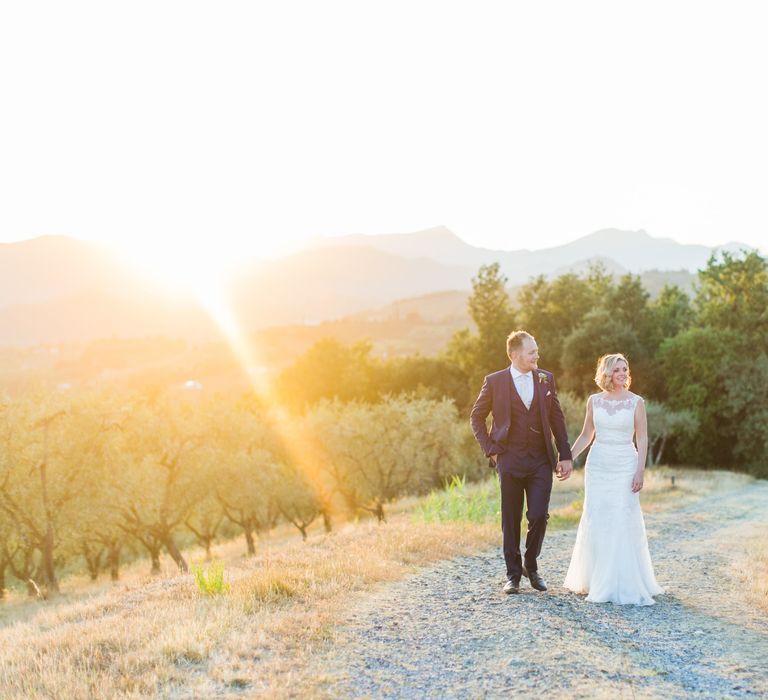 Sunset Portrait | Bride in Lace Stella York Wedding Dress | Groom in Three Piece Navy Suit | Four Day Italian Destination Wedding at Frattoria Mansi Bernadini Planned by Weddings by Emily Charlotte | Cecelina Photography