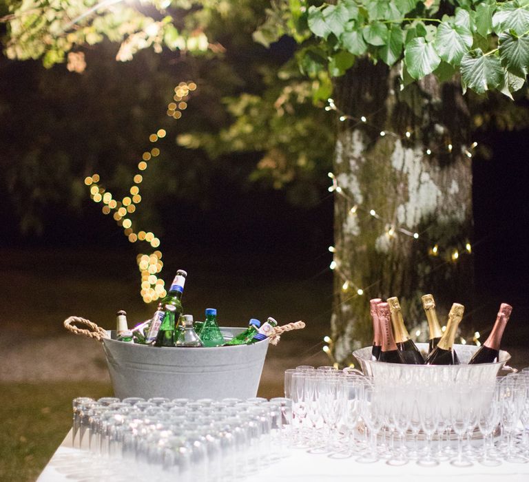 Beer Bottle Troughs | Four Day Italian Destination Wedding at Frattoria Mansi Bernadini Planned by Weddings by Emily Charlotte | Cecelina Photography