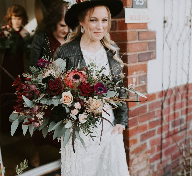 Oversized Deep Red and Green Wedding Bouquet with Roses, Proteas and Foliage