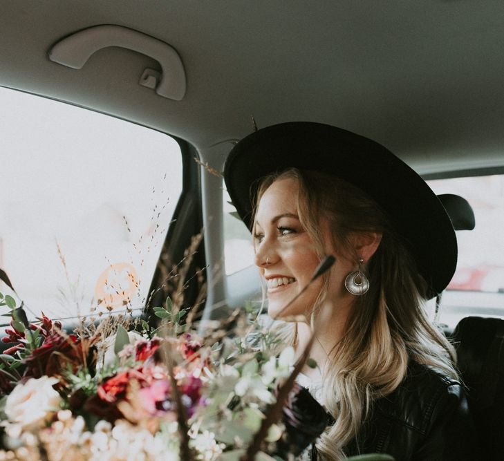 Stylish Bride in Wedding Car