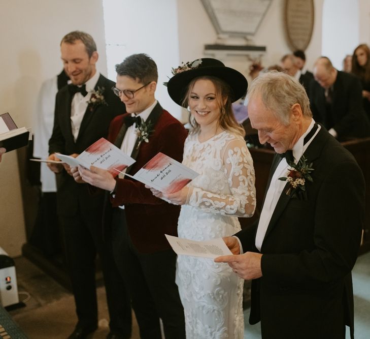 Bride, Groom and Father at the Altar During the Wedding Ceremony