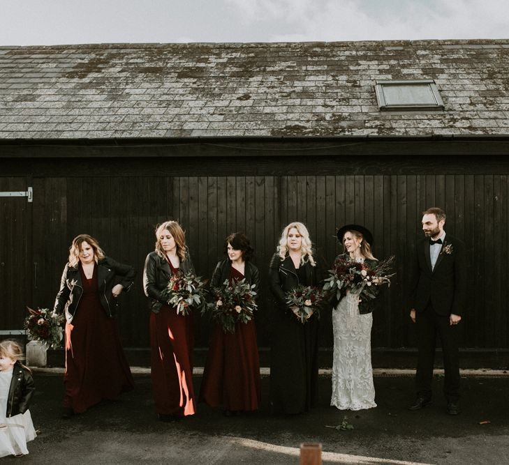 Wedding Party Portrait with Bridesmaids in Deep Red Dresses and Leather Jackets