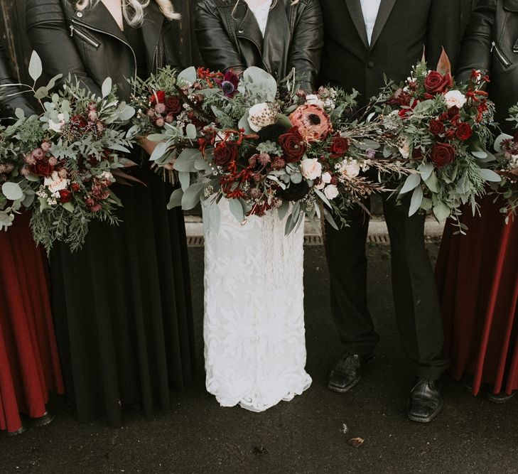 Deep Red and Green Bridal Party Bouquets with Roses, Proteas and Foliage