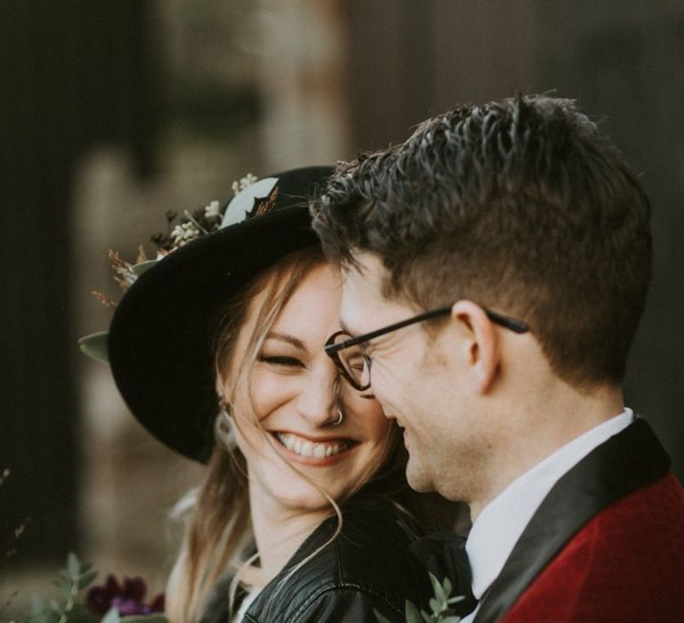 Smiling Bride in Fedora Hat and Leather Jacket