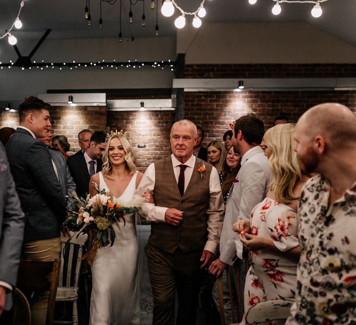 Wedding ceremony bridal entrance with the father of the bride