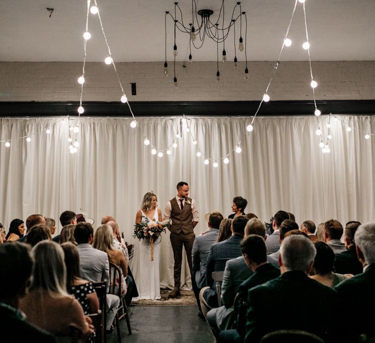 Festoon lit wedding ceremony at New Craven Hall in Leeds