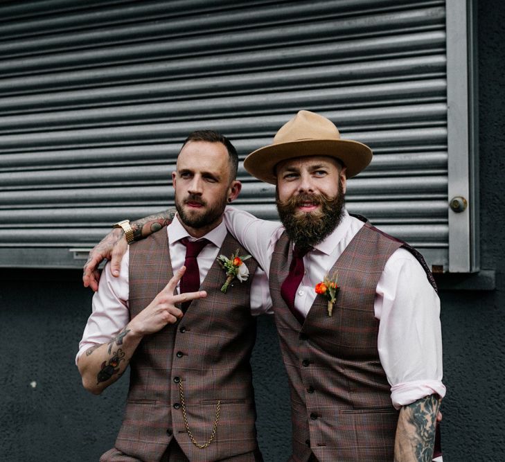 Groom and best man in brown check suits