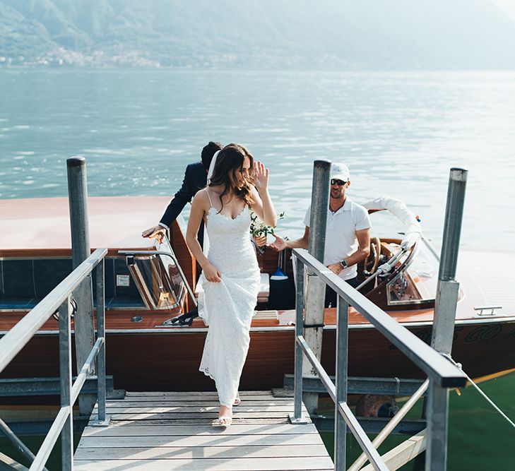 Bride in Grace Loves Lace Mia Wedding Dress Getting Off Boat