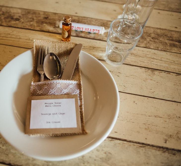 Simplistic table settings at woodland day in autumn with personalised love hearts