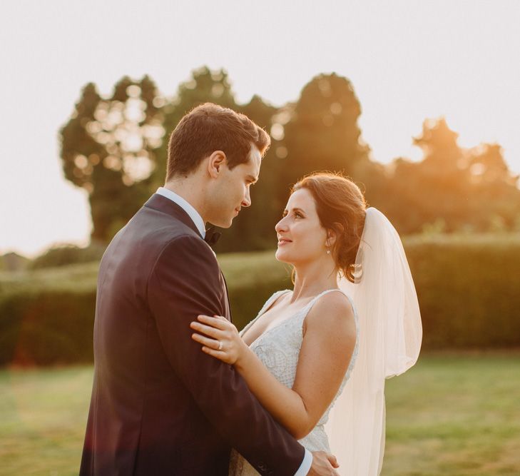 Golden Dusk Couple Shots | Church Wedding Ceremony | Bride in Karen Willis Holmes | Groom in Custom Made Suit by Suit Supply | Summer Wedding at Family Home in Kent | Glass Marquee from Academy Marquees | Frances Sales Photography