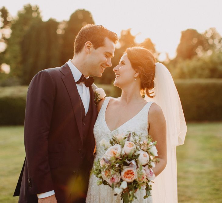 Golden Dusk Couple Shots | Church Wedding Ceremony | Bride in Karen Willis Holmes | Groom in Custom Made Suit by Suit Supply | Summer Wedding at Family Home in Kent | Glass Marquee from Academy Marquees | Frances Sales Photography