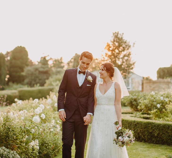 Golden Dusk Couple Shots | Church Wedding Ceremony | Bride in Karen Willis Holmes | Groom in Custom Made Suit by Suit Supply | Summer Wedding at Family Home in Kent | Glass Marquee from Academy Marquees | Frances Sales Photography