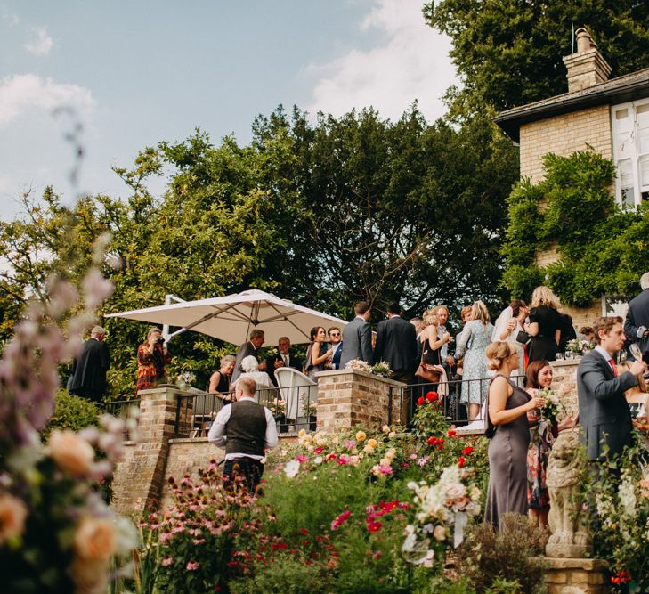 Outdoor Wedding Reception | Bride in Karen Willis Holmes | Groom in Custom Made Suit by Suit Supply | Summer Wedding at Family Home in Kent | Glass Marquee from Academy Marquees | Frances Sales Photography