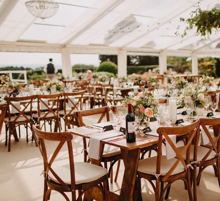 Flowers from Topiary Tree | Hand Stitched Linen Napkins | Bride in Karen Willis Holmes | Groom in Custom Made Suit by Suit Supply | Summer Wedding at Family Home in Kent | Glass Marquee from Academy Marquees | Frances Sales Photography