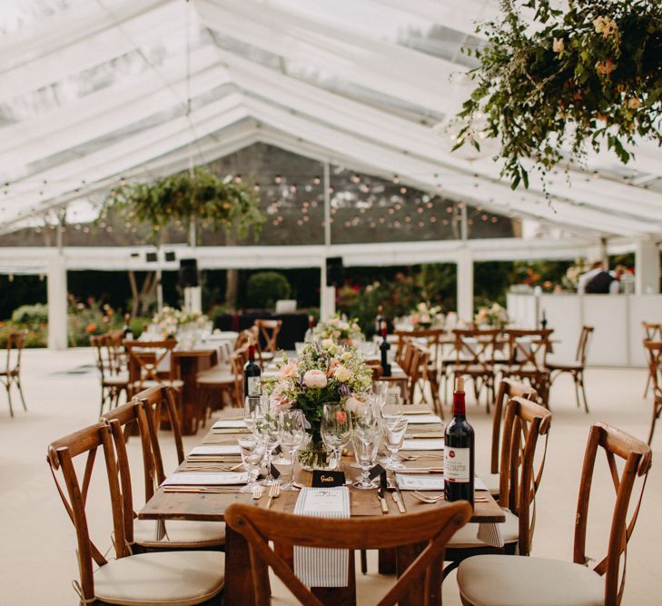 Rustic Tables | Soft gold Finishes | Hand Stitched Linen Napkins | Bride in Karen Willis Holmes | Groom in Custom Made Suit by Suit Supply | Summer Wedding at Family Home in Kent | Glass Marquee from Academy Marquees | Frances Sales Photography