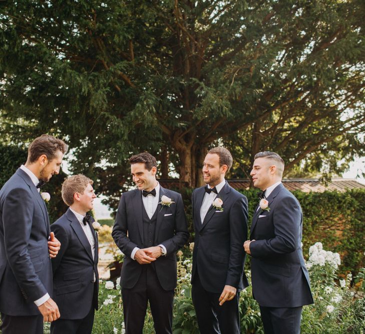 Groom and Groomsmen | Flowers from Topiary Tree | Bride in Karen Willis Holmes | Groom in Custom Made Suit by Suit Supply | Summer Wedding at Family Home in Kent | Glass Marquee from Academy Marquees | Frances Sales Photography