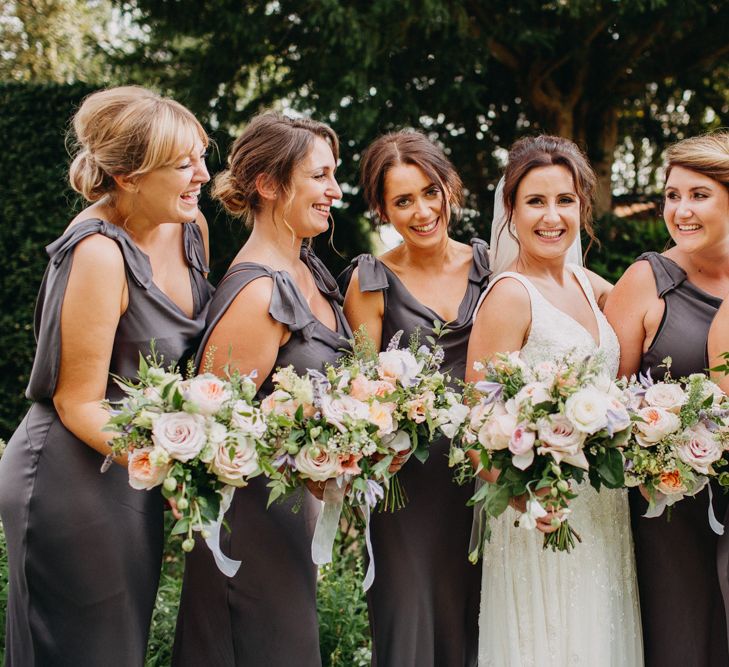 Bride and Bridesmaids | Flowers from Topiary Tree | Bride in Karen Willis Holmes | Groom in Custom Made Suit by Suit Supply | Summer Wedding at Family Home in Kent | Glass Marquee from Academy Marquees | Frances Sales Photography