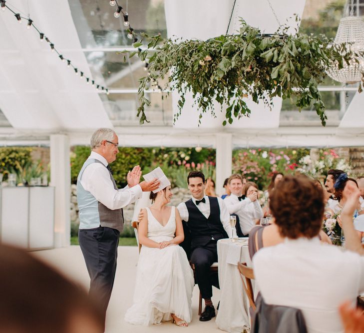 Speeches | Flowers from Topiary Tree | Bride in Karen Willis Holmes | Groom in Custom Made Suit by Suit Supply | Summer Wedding at Family Home in Kent | Glass Marquee from Academy Marquees | Frances Sales Photography