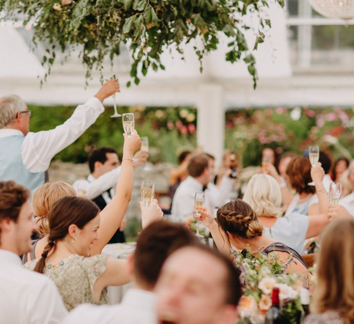 Speeches | Flowers from Topiary Tree | Bride in Karen Willis Holmes | Groom in Custom Made Suit by Suit Supply | Summer Wedding at Family Home in Kent | Glass Marquee from Academy Marquees | Frances Sales Photography