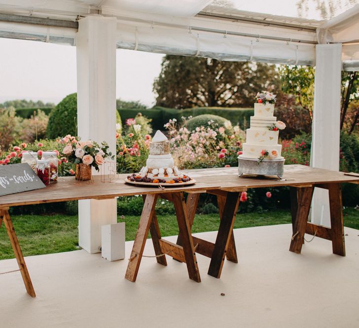 Cake Table | Flowers from Topiary Tree | Bride in Karen Willis Holmes | Groom in Custom Made Suit by Suit Supply | Summer Wedding at Family Home in Kent | Glass Marquee from Academy Marquees | Frances Sales Photography