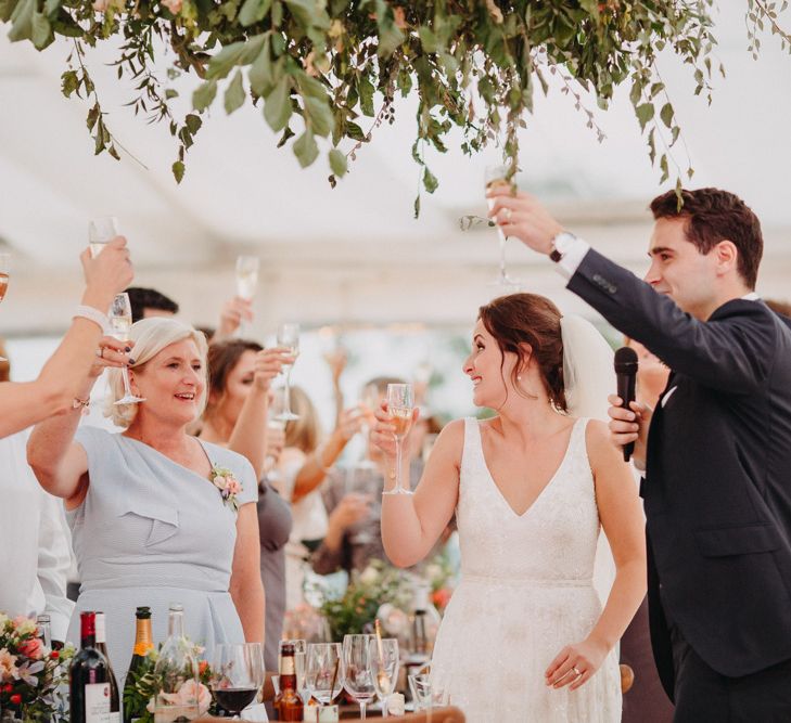 Speeches | Flowers from Topiary Tree | Bride in Karen Willis Holmes | Groom in Custom Made Suit by Suit Supply | Summer Wedding at Family Home in Kent | Glass Marquee from Academy Marquees | Frances Sales Photography