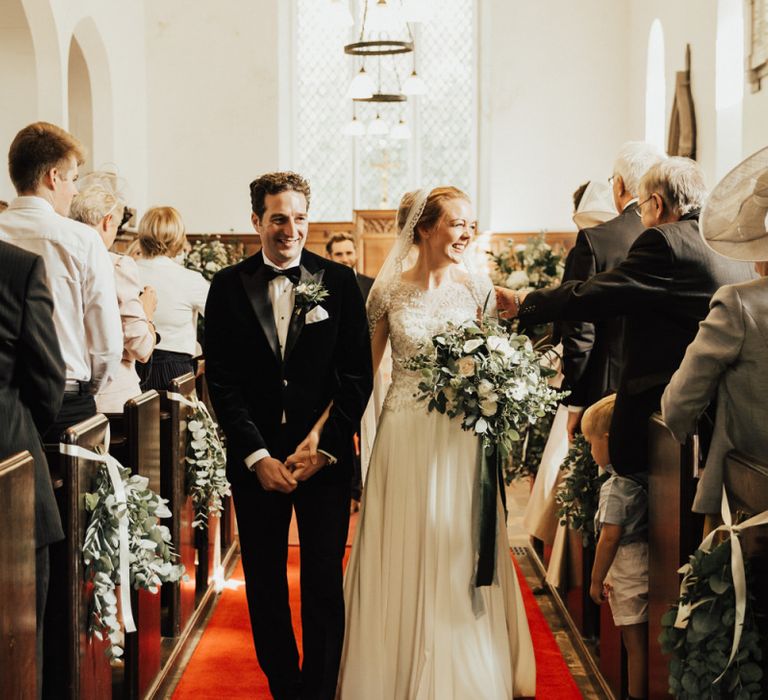 Newlywed husband and wife at Askham Hall wedding