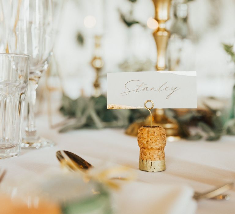 Gold wedding table decoration and place name holders