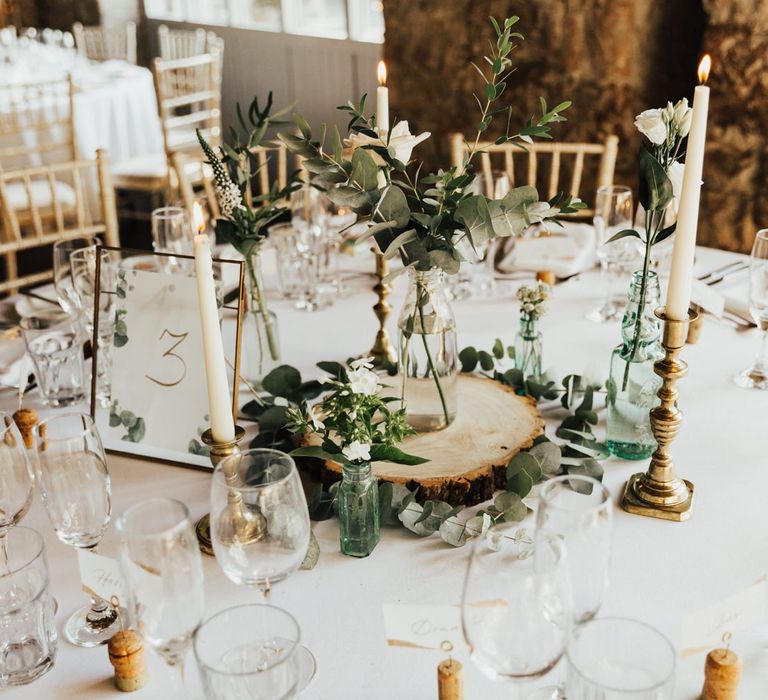 Rustic tree slice wedding table decoration