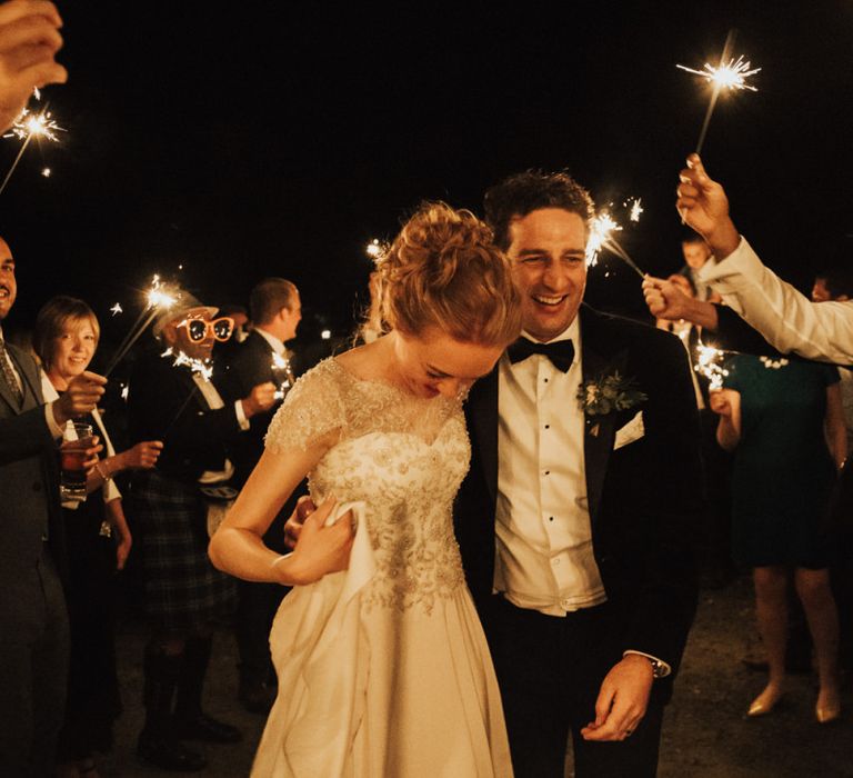 Sparkler exit for bride and groom at Askham Hall wedding