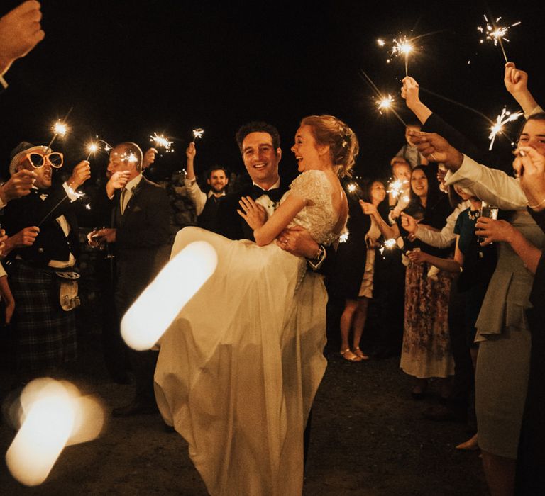 Sparkler exit for bride and groom at Askham Hall wedding