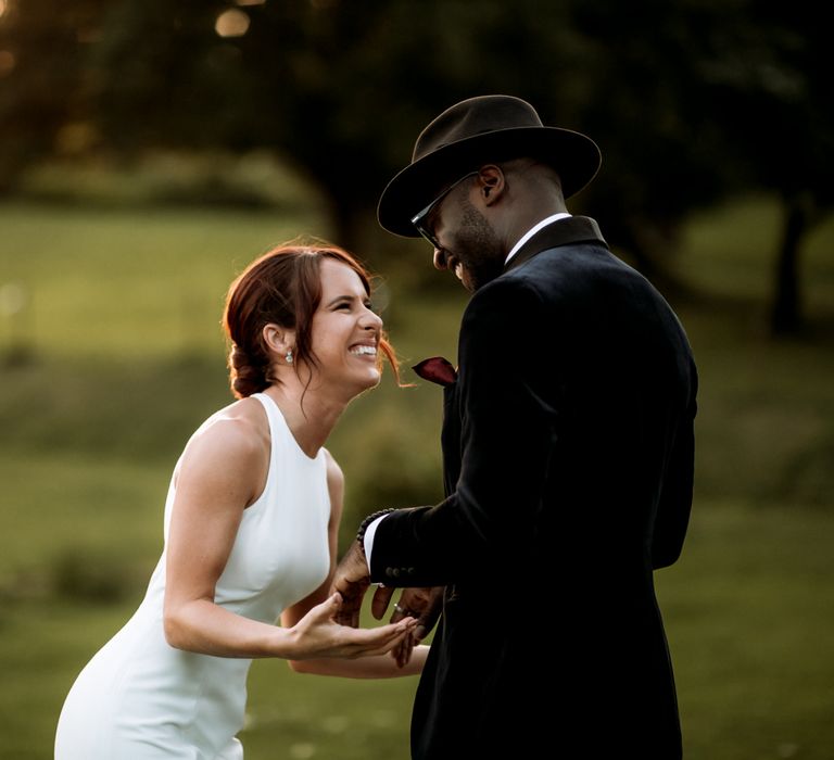 Happy bride and groom portraits by Paul &amp; Nanda