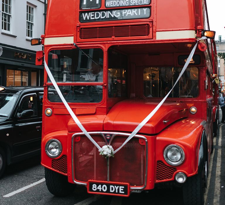 Red London Bus Wedding Transport // The Groucho Club Private Members Club London Wedding With Bride In Sequinned Dress &amp; Flowers By Daisy Ellen Images By Miss Gen Photography