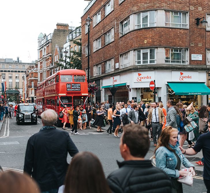 Red London Bus Wedding Transport // The Groucho Club Private Members Club London Wedding With Bride In Sequinned Dress &amp; Flowers By Daisy Ellen Images By Miss Gen Photography