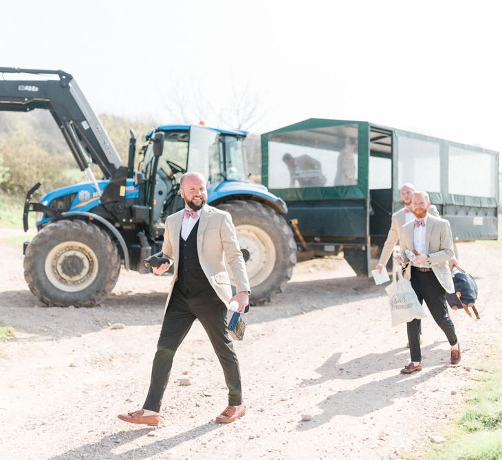 Groom in Black Chino's and Beige Blazer with Bow Tie and Loafers