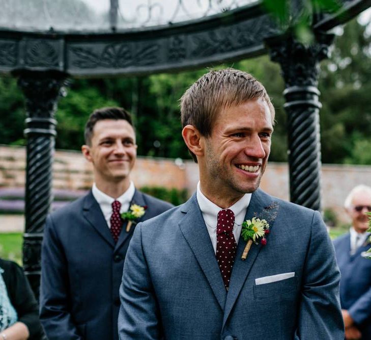 Groom Watches Bride Walk Down The Aisle